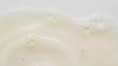 Macro shot of milk being poured
